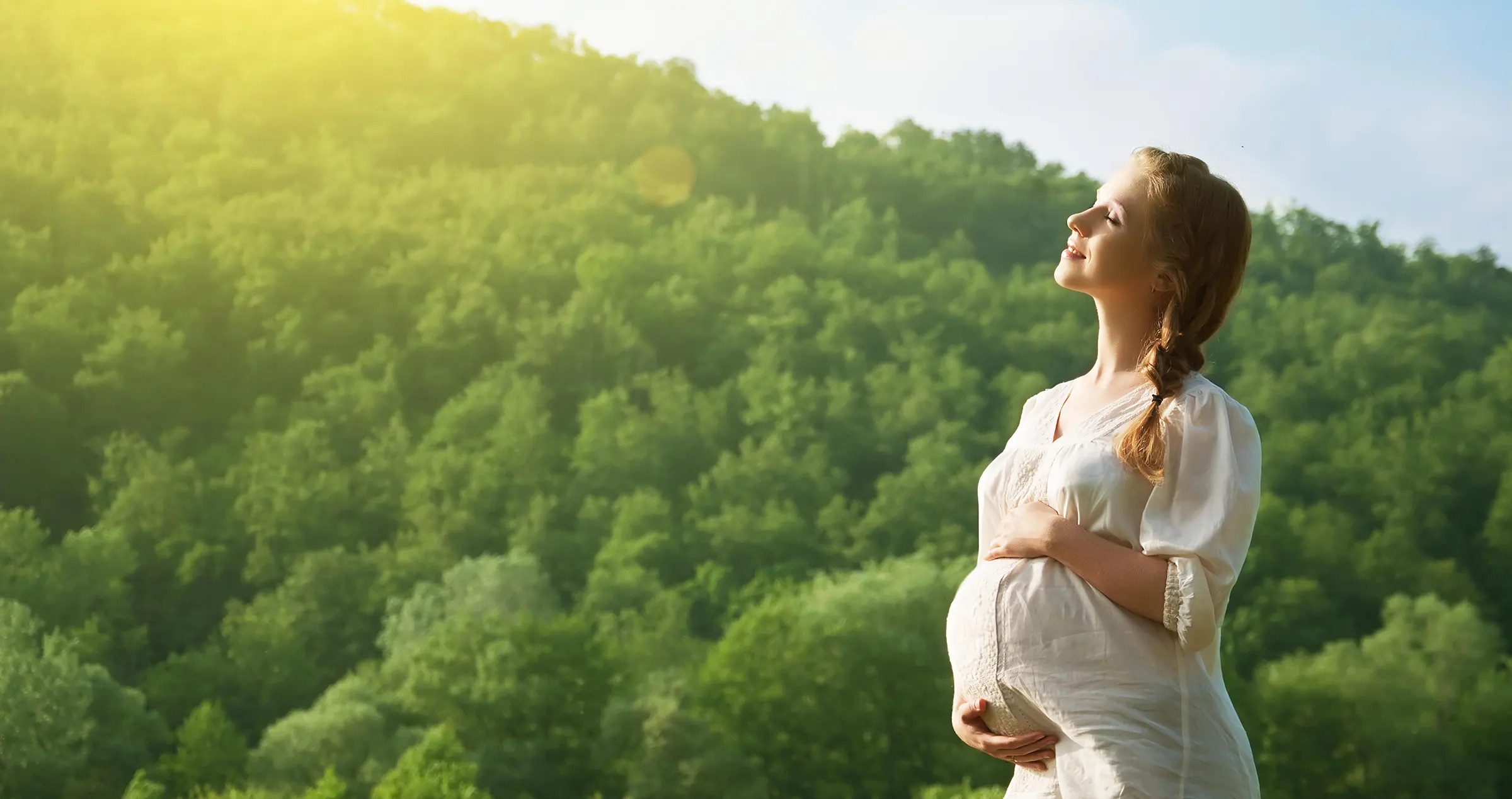 A happy mother smiles to a happy baby.